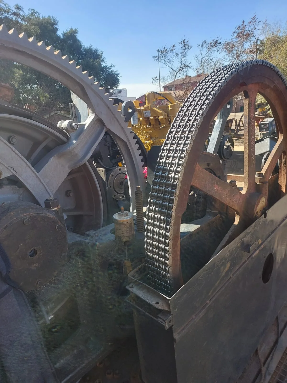 Large exposed gears and chain drive in the MOSS Bucyrus crane assembly project.